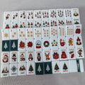 Candy Cane Christmas American Mahjong set laid out: candy cane, ornament and snowflake suits, Soap, Green and Red dragons, Flowers, Jokers, Winds and dark green tile backs