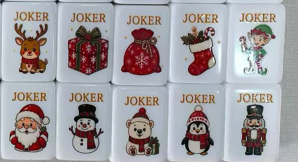 Ten Christmas Joker tiles: reindeer, gift box, Santa's sack, stocking, elf, Santa, snowman, polar bear, penguin and nutcracker