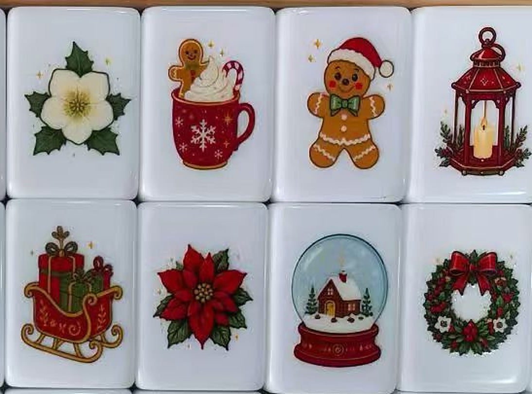 Eight Christmas Flower tiles: Christmas rose, cocoa mug, gingerbread man, lantern, sleigh, poinsettia, snow globe and wreath