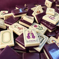 Purple-Red Panda American mahjong tiles with plum backs, cream faces, purple panda Jokers and floral artwork