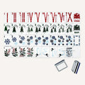 Winter Skiing American mahjong tiles with red skis, green evergreen trees, blue snowflakes and a polar-bear Joker on white faces