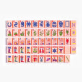 Pink Farm American mahjong tiles with pink faces, horseshoes, green cacti, sunrise patterns and floral cowboy boots