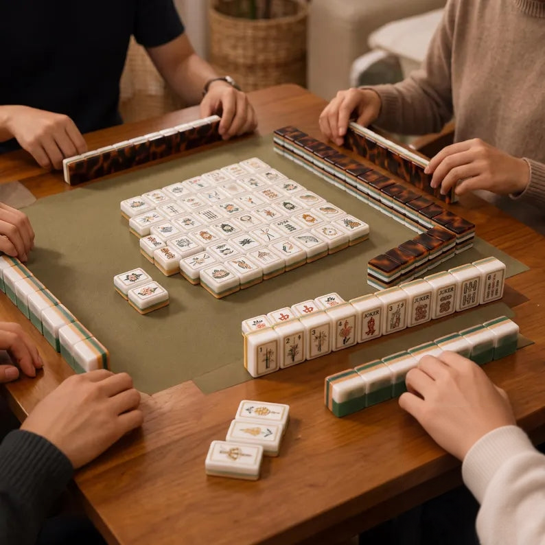 Botanical mahjong tiles arranged on a game table